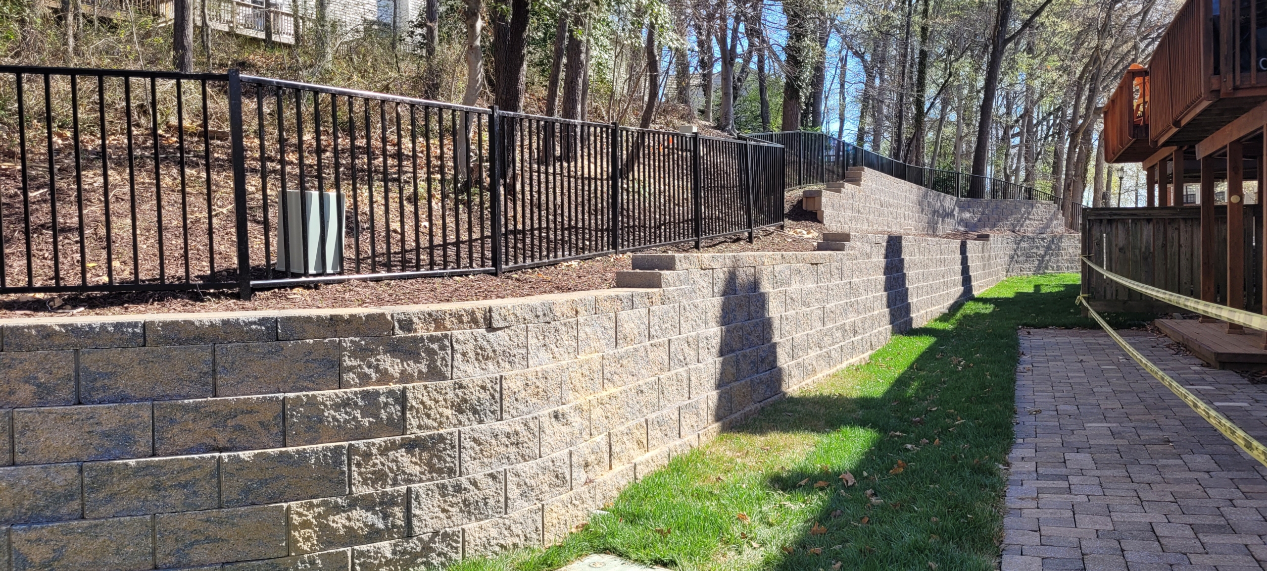 Newly constructed segmental retaining wall.